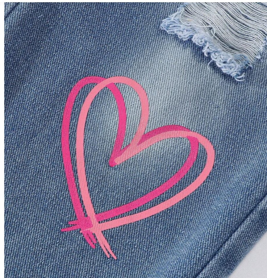 wide-leg fit pants with playful pink heart prints