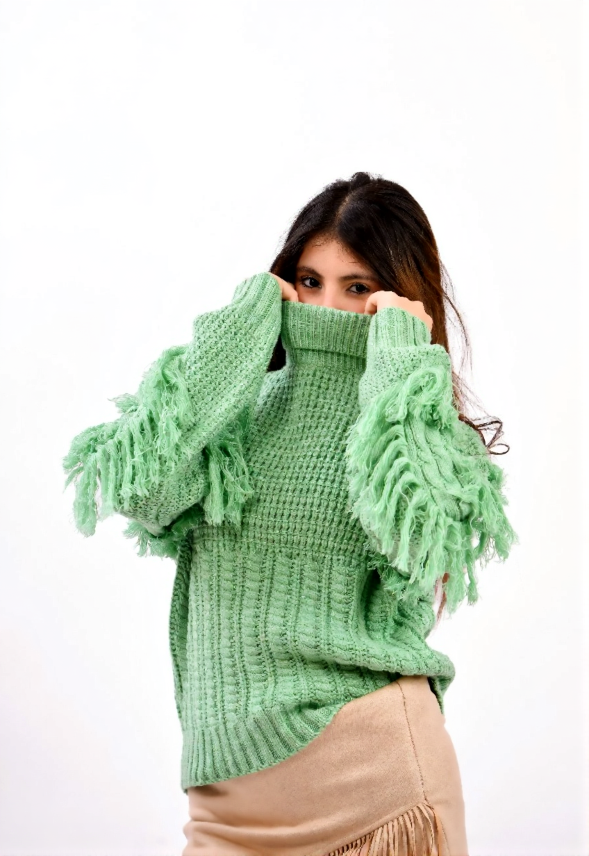 fringe detailing along the sleeves and sides sweater