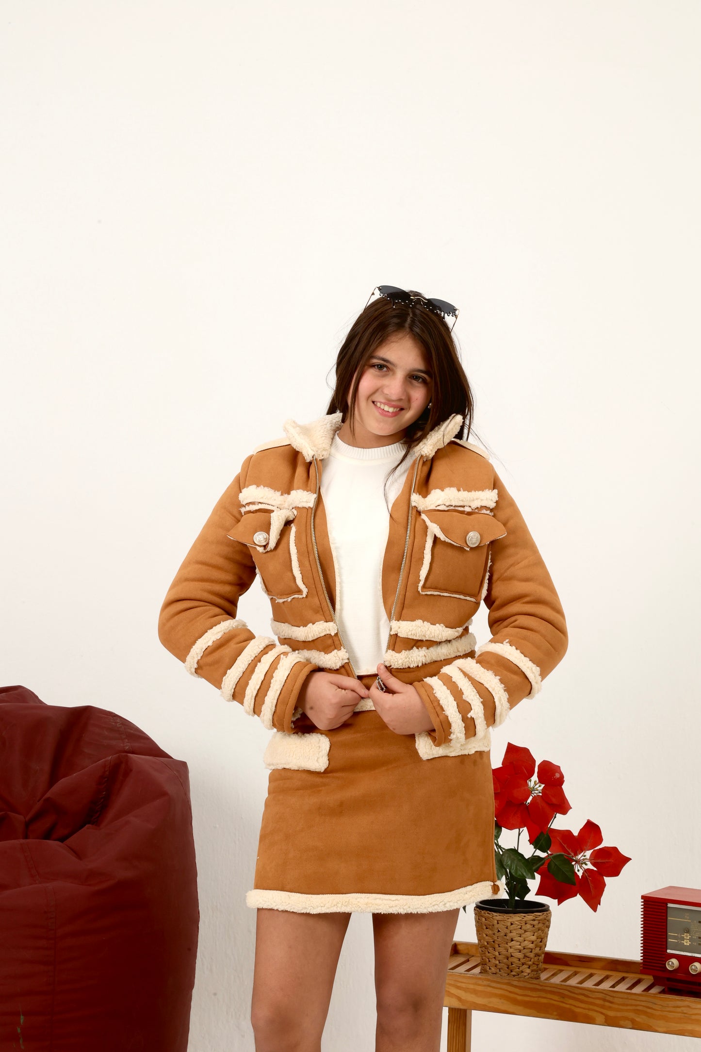 jacket paired with a matching mini skirt