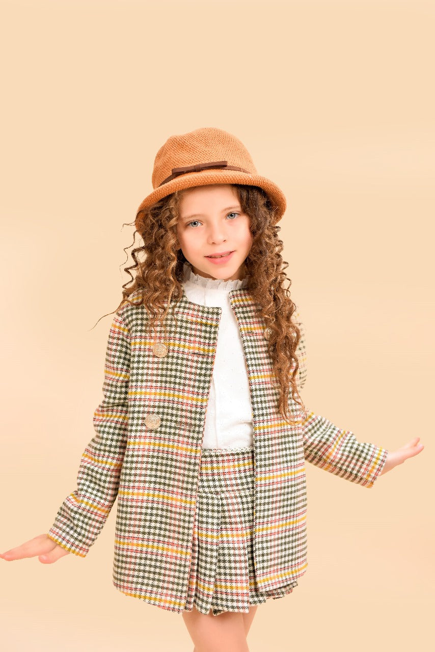 tweed two-piece set a tailored jacket and pleated skirt.