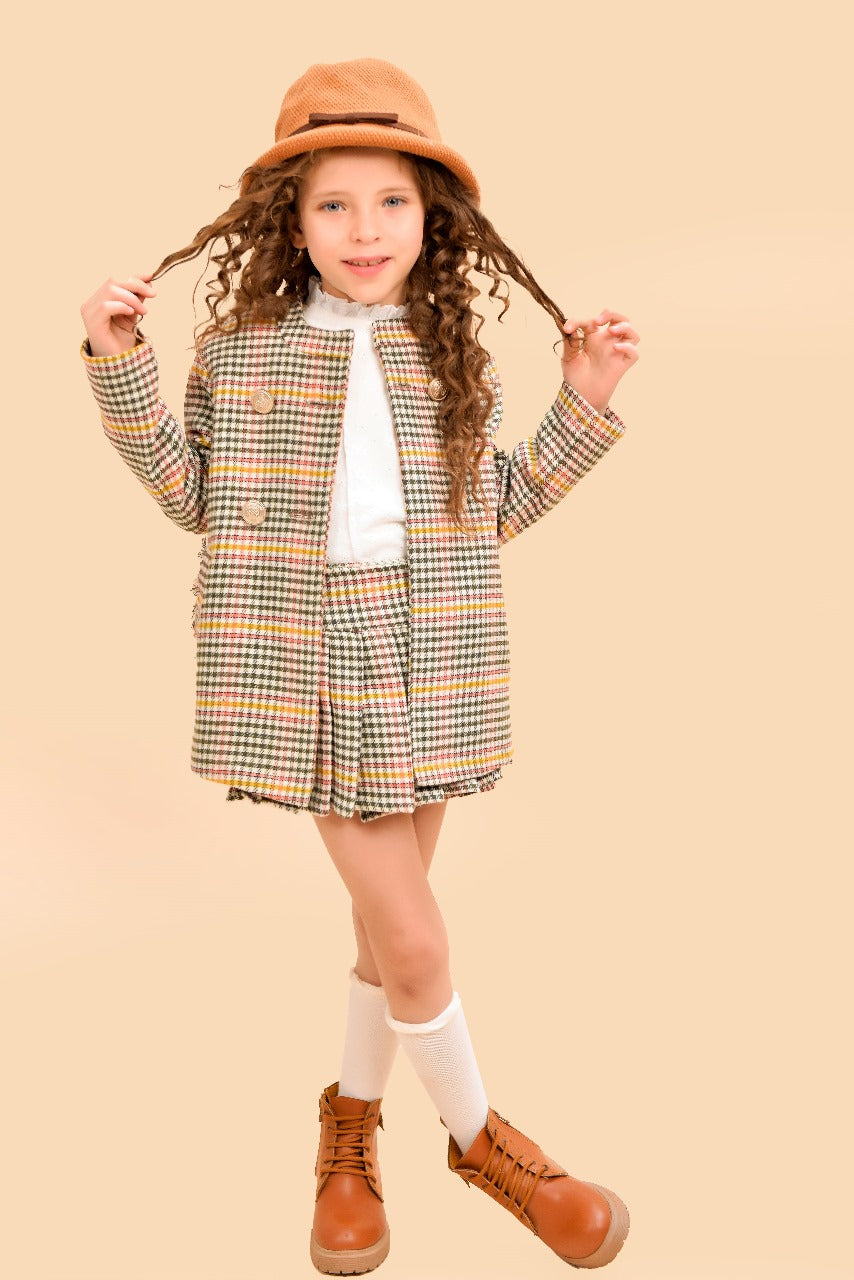 tweed two-piece set a tailored jacket and pleated skirt.